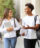 Two college students walking to class