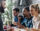 Group of young adults enjoying a meal